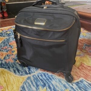 Tumi Small Black Travel Bag with Gold Accents